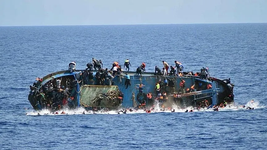 Overcrowded migrant boat capsizing in the Mediterranean Sea